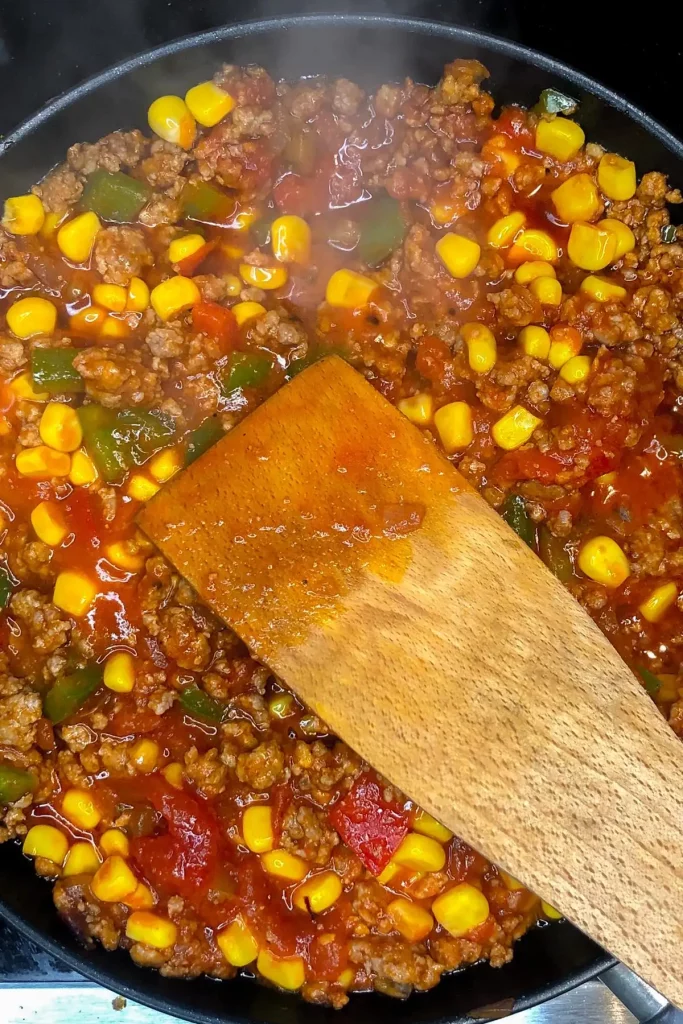 Mexican burrito stuffing with corn ground and meat